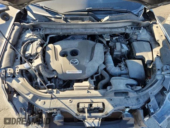 ✅ 2021 Mazda CX-5 Signature • VIN: JM3KFBEY3M0427011 • Lot: 90422385. Wystawiony na Copart z przebiegiem 79 818 mil. Bezpłatny archiwum sprzedaży aukcyjnych z USA i szczegółowy raport historii pojazdu na DreamBid. Zdjęcie 12.