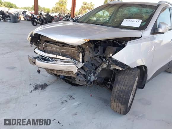 2013 Hyundai Tucson GLS z VIN KM8JU3AC4DU548497, wystawiony jako IAAI lot #42136551 z przebiegiem Nie podano mil oraz . Historia ofert i sprzedaży dostępna na DreamBid. Obrazek 6.