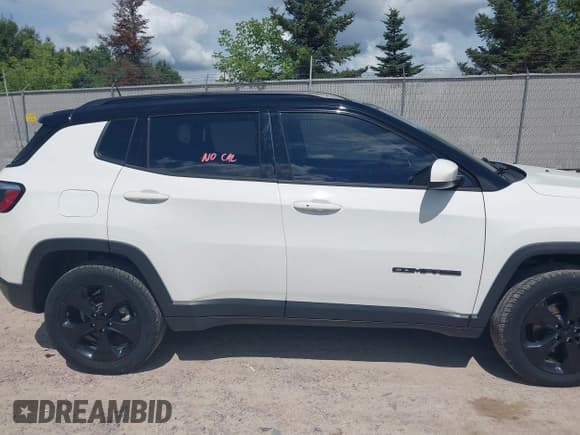 ✅ 2018 Jeep Compass Latitude • VIN: 3C4NJDBB9JT457791 • Lot: 43026669. Listed on IAAI with 103,309 mi. Free auction sales archive from the USA and detailed vehicle history report at DreamBid. Image 13.