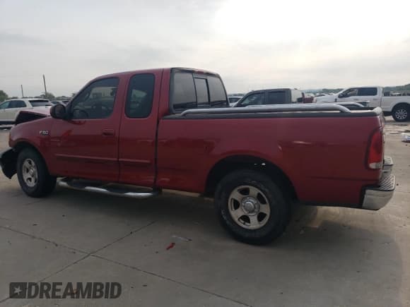 ✅ 2001 Ford F-150 • VIN: 2FTZX17281CA44273 • Lot: 63678044. Listed on Copart with 175,404 mi. Free auction sales archive from the USA and detailed vehicle history report at DreamBid. Image 2.