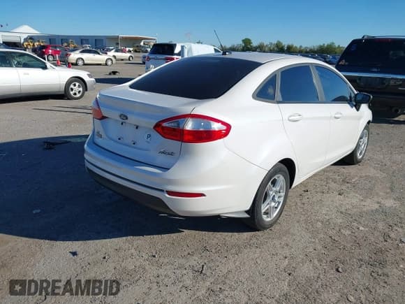 ✅ 2017 Ford Fiesta SE • VIN: 3FADP4BJ4HM126371 • Lot: 43557682. Listed on IAAI with 101,447 mi. Free auction sales archive from the USA and detailed vehicle history report at DreamBid. Image 4.