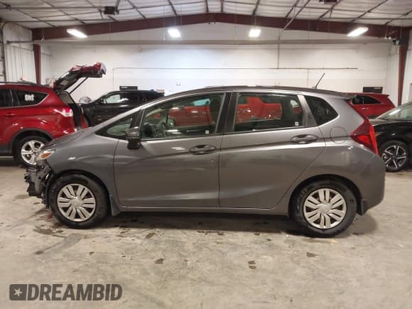 ✅ 2015 Honda Fit LX • VIN: 3HGGK5H52FM760475 • Lot: 43779133. Listed on IAAI with 115,336 mi. Free auction sales archive from the USA and detailed vehicle history report at DreamBid. Image 15.
