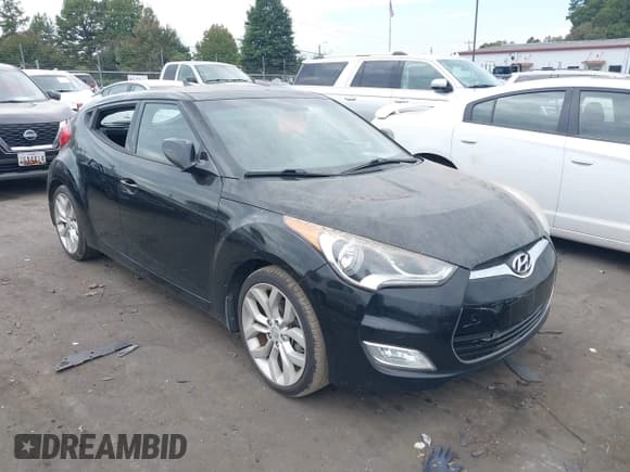 ✅ 2013 Hyundai Veloster w/Gray Int • VIN: KMHTC6AD6DU155445 • Lot: 43285405. Wystawiony na IAAI z przebiegiem 126 975 mil. Bezpłatny archiwum sprzedaży aukcyjnych z USA i szczegółowy raport historii pojazdu na DreamBid. Zdjęcie 1.