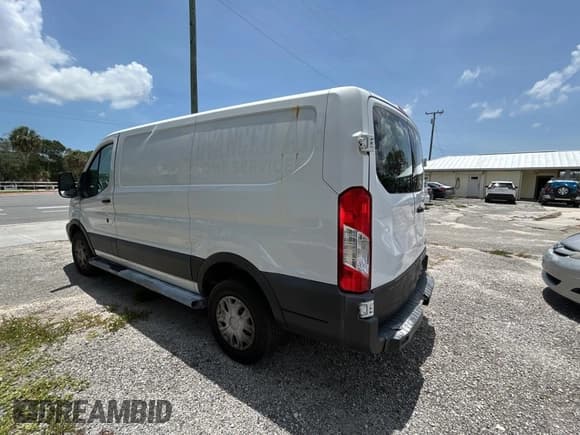 ✅ 2015 Ford Transit Cargo • VIN: 1FTNR1ZM6FKA47229 • Lot: 61978315. Listed on Copart with 227,678 mi. Free auction sales archive from the USA and detailed vehicle history report at DreamBid. Image 3.