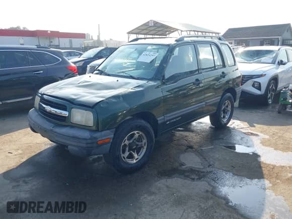 1999 Chevrolet Tracker z VIN 2CNBJ13C9X6928226, wystawiony jako IAAI lot #42824297 z przebiegiem 109 075 mil mil oraz . Historia ofert i sprzedaży dostępna na DreamBid. Obrazek 18.