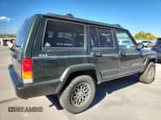 ✅ 1998 Jeep Cherokee Sport • VIN: 1J4FJ68S5WL152521 • Лот: 82504035. Опубликован ранее на Copart с пробегом 129 013 миль. Бесплатный доступ к архиву аукционных продаж из США и подробный отчёт об истории автомобиля на DreamBid. Изображение 3.