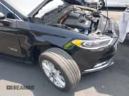 ✅ 2018 Ford Fusion Titanium • VIN: 3FA6P0SU3JR110585 • Lot: 42703340. Listed on IAAI with 113,723 mi. Free auction sales archive from the USA and detailed vehicle history report at DreamBid. Image 17.