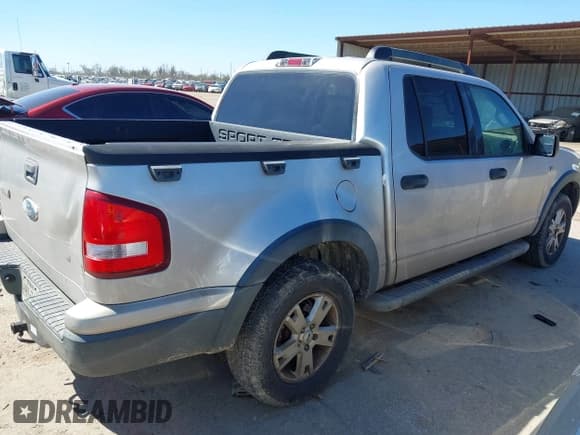 ✅ 2007 Ford Explorer Sport Trac XLT • VIN: 1FMEU31857UA02325 • Лот: 41696359. Опубликован ранее на IAAI с пробегом 264 385 миль. Бесплатный доступ к архиву аукционных продаж из США и подробный отчёт об истории автомобиля на DreamBid. Изображение 4.