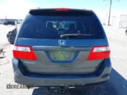 ✅ 2006 Honda Odyssey EX-L • VIN: 5FNRL38736B435011 • Lot: 43266818. Listed on IAAI with 95,103 mi. Free auction sales archive from the USA and detailed vehicle history report at DreamBid. Image 16.