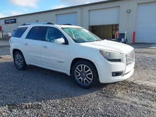 ✅ 2014 GMC Acadia Denali • VIN: 1GKKRTKD1EJ105359 • Lot: 43763434. Listed on IAAI with 226,824 mi. Free auction sales archive from the USA and detailed vehicle history report at DreamBid. Image 1.