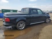 ✅ 2003 Ford F-150 Harley-Davidson • VIN: 1FTRW07373KD66326 • Lot: 59382485. Listed on Copart with 84,079 mi. Free auction sales archive from the USA and detailed vehicle history report at DreamBid. Image 3.