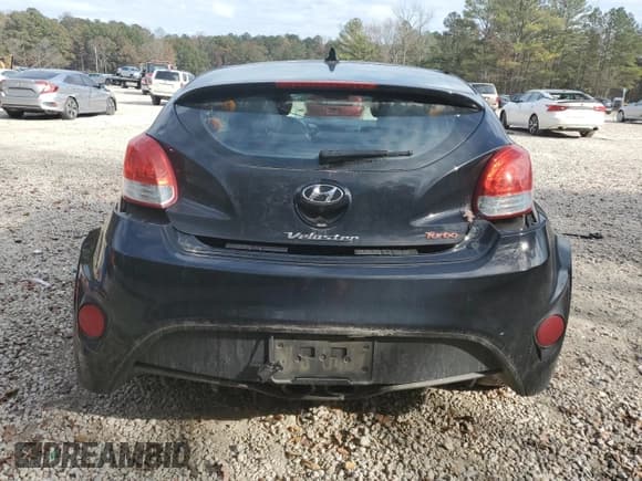 ✅ 2014 Hyundai Veloster Turbo • VIN: KMHTC6AE3EU199347 • Lot: 79878434. Wystawiony na Copart z przebiegiem 154 962 mil. Bezpłatny archiwum sprzedaży aukcyjnych z USA i szczegółowy raport historii pojazdu na DreamBid. Zdjęcie 6.