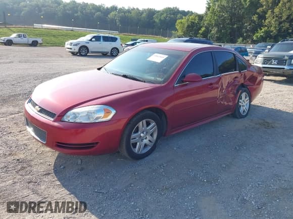 ✅ 2014 Chevrolet Impala LT • VIN: 2G1WB5E34E1163971 • Lot: 43047669. Listed on IAAI with 215,678 mi. Free auction sales archive from the USA and detailed vehicle history report at DreamBid. Image 2.