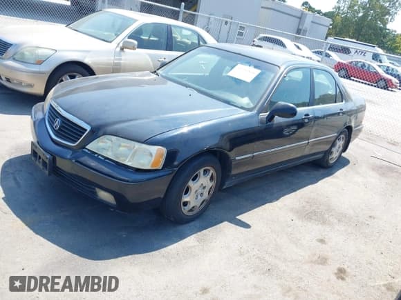 ✅ 2000 Acura RL • VIN: JH4KA9651YC007450 • Лот: 43230868. Опубликован ранее на IAAI с пробегом 194 317 миль. Бесплатный доступ к архиву аукционных продаж из США и подробный отчёт об истории автомобиля на DreamBid. Изображение 2.