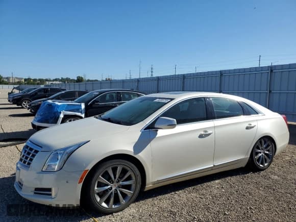 ✅ 2013 Cadillac XTS Luxury • VIN: 2G61R5S30D9213527 • Lot: 70205735. Listed on Copart with 152,844 mi. Free auction sales archive from the USA and detailed vehicle history report at DreamBid. Image 1.