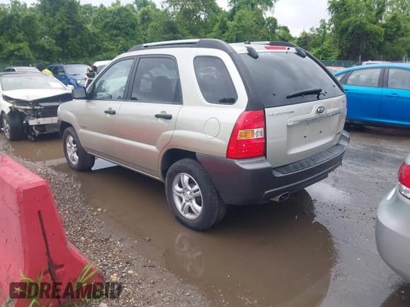 ✅ 2007 Kia Sportage LX • VIN: KNDJE723677332922 • Лот: 42255864. Опубликован ранее на IAAI с пробегом 194 622 миль. Бесплатный доступ к архиву аукционных продаж из США и подробный отчёт об истории автомобиля на DreamBid. Изображение 3.