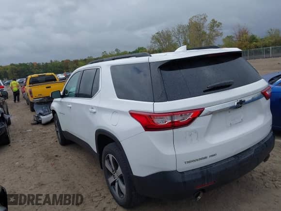 2020 Chevrolet Traverse LT with VIN 1GNEVHKW1LJ300157, listed as a IAAI auction lot 43360072 with 76,992 mi miles and . Bid and sale history available at DreamBid. Image 3.