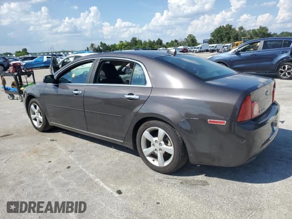 ✅ 2012 Chevrolet Malibu 1LT • VIN: 1G1ZC5E04CF384282 • Lot: 67039585. Listed on Copart with 184,458 mi. Free auction sales archive from the USA and detailed vehicle history report at DreamBid. Image 2.
