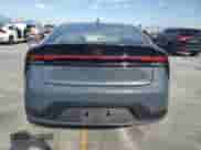 2024 Toyota Prius LE with VIN JTDACAAU6R3037083, listed as a Copart auction lot 83825335 with 27,248 mi miles and Salvage title. Bid and sale history available at DreamBid. Image 6.