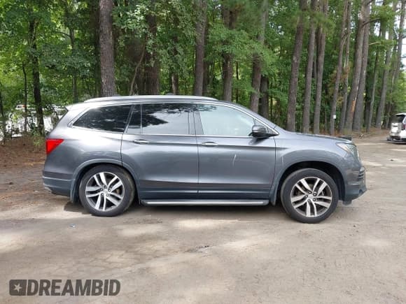 ✅ 2017 Honda Pilot Elite • VIN: 5FNYF6H02HB100235 • Lot: 43026575. Wystawiony na IAAI z przebiegiem 174 362 mil. Bezpłatny archiwum sprzedaży aukcyjnych z USA i szczegółowy raport historii pojazdu na DreamBid. Zdjęcie 13.