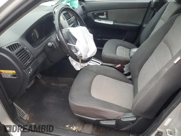 ✅ 2009 Kia Spectra EX • VIN: KNAFE222795027263 • Lot: 93812205. Listed on Copart with 164,002 mi. Free auction sales archive from the USA and detailed vehicle history report at DreamBid. Image 7.