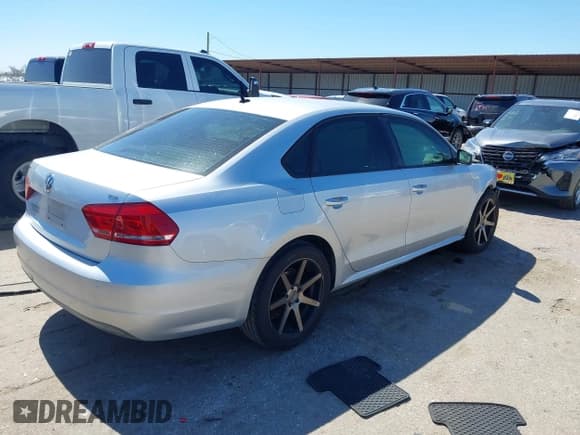 ✅ 2015 Volkswagen Passat Limited Edition • VIN: 1VWAT7A30FC014689 • Lot: 41758748. Listed on IAAI with 140,545 mi. Free auction sales archive from the USA and detailed vehicle history report at DreamBid. Image 4.