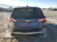 ✅ 2018 Chevrolet Equinox Premier • VIN: 3GNAXWEX7JL137229 • Lot: 87064295. Wystawiony na Copart z przebiegiem 63 324 mil. Bezpłatny archiwum sprzedaży aukcyjnych z USA i szczegółowy raport historii pojazdu na DreamBid. Zdjęcie 6.