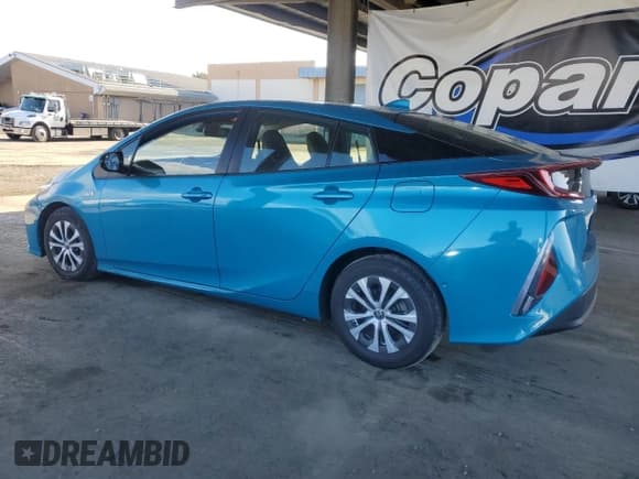 ✅ 2021 Toyota Prius LE • VIN: JTDKAMFP3M3188745 • Lot: 91725425. Listed on Copart with 62,271 mi. Free auction sales archive from the USA and detailed vehicle history report at DreamBid. Image 2.