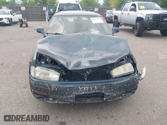 ✅ 1994 Toyota Camry LE • VIN: 4T1GK12W1RU020520 • Lot: 42767455. Wystawiony na IAAI z przebiegiem 276 166 mil. Bezpłatny archiwum sprzedaży aukcyjnych z USA i szczegółowy raport historii pojazdu na DreamBid. Zdjęcie 6.