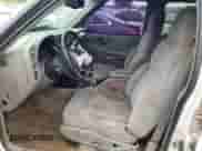 1999 Chevrolet Blazer LS z VIN 1GNDT13W9X2166733, wystawiony jako Copart lot #64965434 z przebiegiem 214 296 mil mil oraz Nie do naprawy • Non repairable. Historia ofert i sprzedaży dostępna na DreamBid. Obrazek 7.