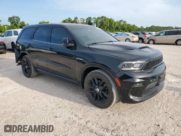 2022 Dodge Durango R/T with VIN 1C4SDHCT5NC101641, listed as a Copart auction lot 67034185 with 76,923 mi miles and Salvage title. Bid and sale history available at DreamBid. Image 4.