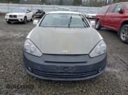 ✅ 2008 Hyundai Tiburon GS • VIN: KMHHM66DX8U290039 • Лот: 95370315. Опубликован ранее на Copart с пробегом 130 680 миль. Бесплатный доступ к архиву аукционных продаж из США и подробный отчёт об истории автомобиля на DreamBid. Изображение 5.