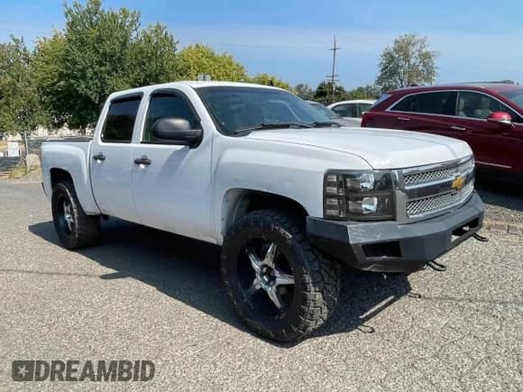 2013 Chevrolet Silverado 1500 LT z VIN 3GCPKSE71DG102953, wystawiony jako Copart lot #76147354 z przebiegiem 169 616 mil mil oraz Czysty tytuł • Clean title. Historia ofert i sprzedaży dostępna na DreamBid. Obrazek 1.