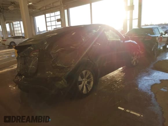 ✅ 2023 Tesla Model Y Long Range • VIN: 7SAYGDEE5PA033341 • Lot: 41379625. Listed on IAAI with Not provided. Free auction sales archive from the USA and detailed vehicle history report at DreamBid. Image 4.