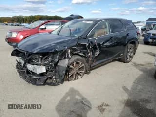✅ 2021 Lexus RX 450hL • VIN: JTJHGKFAXM2016479 • Лот: 89590305. Опубликован ранее на Copart с пробегом 116 300 миль. Бесплатный доступ к архиву аукционных продаж из США и подробный отчёт об истории автомобиля на DreamBid. Изображение 1.
