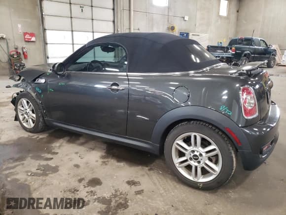 ✅ 2013 MINI Roadster S • VIN: WMWSY3C57DT593979 • Lot: 68924454. Listed on Copart with 61,578 mi. Free auction sales archive from the USA and detailed vehicle history report at DreamBid. Image 2.
