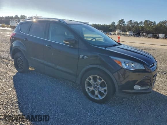 ✅ 2014 Ford Escape Titanium • VIN: 1FMCU9J93EUE05252 • Lot: 94070425. Wystawiony na Copart z przebiegiem 229 837 mil. Bezpłatny archiwum sprzedaży aukcyjnych z USA i szczegółowy raport historii pojazdu na DreamBid. Zdjęcie 4.