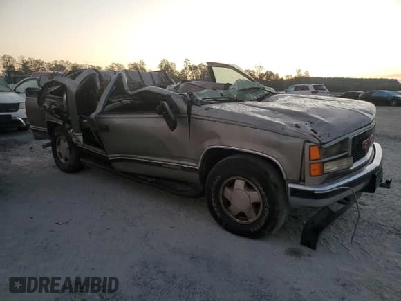 ✅ 1999 GMC Suburban • VIN: 1GKFK16RXXJ734234 • Лот: 74974834. Опубликован ранее на Copart с пробегом Не указан. Бесплатный доступ к архиву аукционных продаж из США и подробный отчёт об истории автомобиля на DreamBid. Изображение 4.