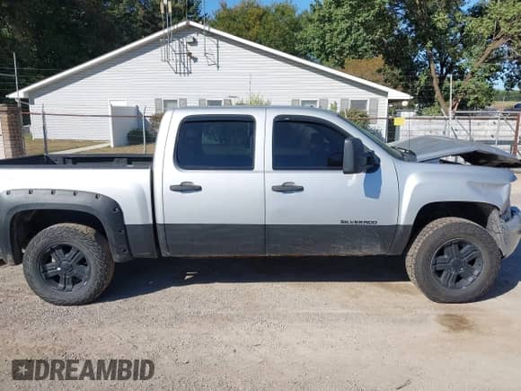 2011 Chevrolet Silverado 1500 LT z VIN 3GCPKSE35BG404711, wystawiony jako IAAI lot #43175333 z przebiegiem 234 937 mil mil oraz . Historia ofert i sprzedaży dostępna na DreamBid. Obrazek 14.