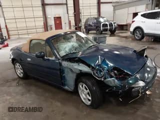 ✅ 1996 Mazda MX-5 Miata • VIN: JM1NA3537T0716664 • Lot: 42078743. Listed on IAAI with 111,813 mi. Free auction sales archive from the USA and detailed vehicle history report at DreamBid. Image 1.