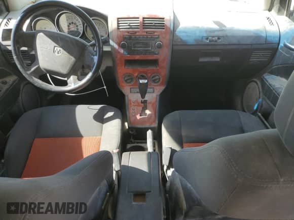 2008 Dodge Caliber SXT с VIN 1B3HB48B78D681015, выставлен на аукционе Copart как лот 75892274 с пробегом 174 508 миль миль и Списание • Salvage title. История ставок и продаж доступна на DreamBid. Изображение 8.