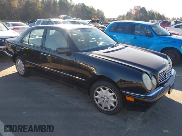 ✅ 1998 Mercedes-Benz E 320 • VIN: WDBJF65F3WA633595 • Lot: 43784666. Listed on IAAI with 127,881 mi. Free auction sales archive from the USA and detailed vehicle history report at DreamBid. Image 1.