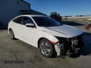 ✅ 2018 Honda Civic LX • VIN: 19XFC2F51JE202855 • Лот: 91293445. Опубликован ранее на Copart с пробегом 56 359 миль. Бесплатный доступ к архиву аукционных продаж из США и подробный отчёт об истории автомобиля на DreamBid. Изображение 4.