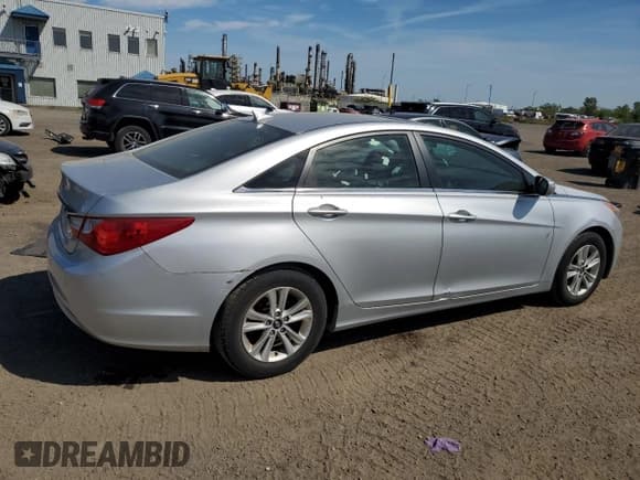 ✅ 2013 Hyundai Sonata GLS • VIN: 5NPEB4AC9DH637638 • Lot: 69051544. Listed on Copart with 125,099 mi. Free auction sales archive from the USA and detailed vehicle history report at DreamBid. Image 3.