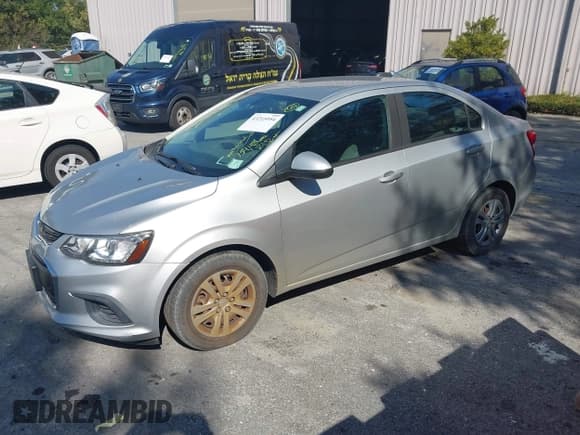 ✅ 2017 Chevrolet Sonic LS • VIN: 1G1JB5SG5H4174777 • Lot: 43215954. Listed on IAAI with 154,486 mi. Free auction sales archive from the USA and detailed vehicle history report at DreamBid. Image 2.