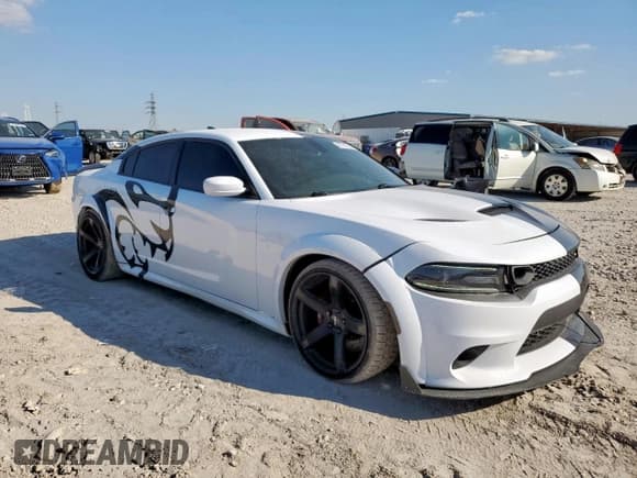 ✅ 2018 Dodge Charger • VIN: 0K0740032512 • Лот: 85167555. Опубликован ранее на Copart с пробегом 56 499 миль. Бесплатный доступ к архиву аукционных продаж из США и подробный отчёт об истории автомобиля на DreamBid. Изображение 4.