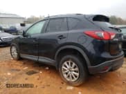 ✅ 2016 Mazda CX-5 Touring • VIN: JM3KE2CY3G0876747 • Lot: 90040135. Listed on Copart with 99,927 mi. Free auction sales archive from the USA and detailed vehicle history report at DreamBid. Image 2.