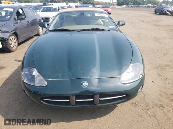 ✅ 2003 Jaguar XK • VIN: SAJDA42C532A36020 • Lot: 60656805. Wystawiony na Copart z przebiegiem 65 020 mil. Bezpłatny archiwum sprzedaży aukcyjnych z USA i szczegółowy raport historii pojazdu na DreamBid. Zdjęcie 5.