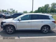 ✅ 2020 Infiniti QX60 Luxe • VIN: 5N1DL0MNXLC533955 • Lot: 42439704. Listed on IAAI with 92,007 mi. Free auction sales archive from the USA and detailed vehicle history report at DreamBid. Image 14.