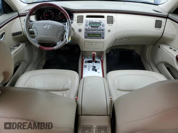 2007 Hyundai Azera SE с VIN KMHFC46F87A176797, выставлен на аукционе Copart как лот 55836555 с пробегом 120 697 миль миль и Списание • Salvage title. История ставок и продаж доступна на DreamBid. Изображение 8.